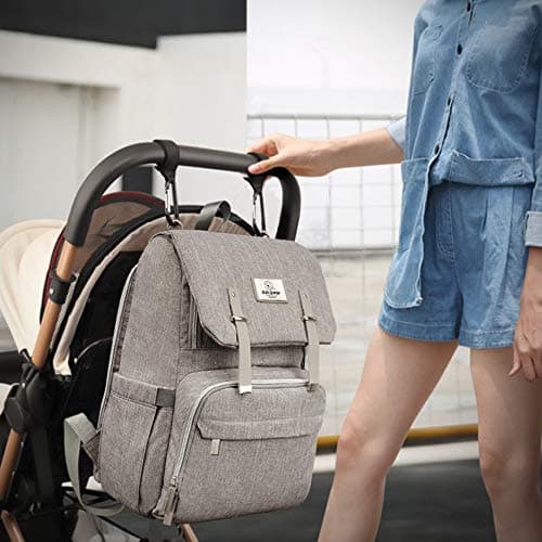 Sac à dos à langer qui s'accroche facilement à la poussette avec son système d'anneaux, grande capacité pour papa et maman